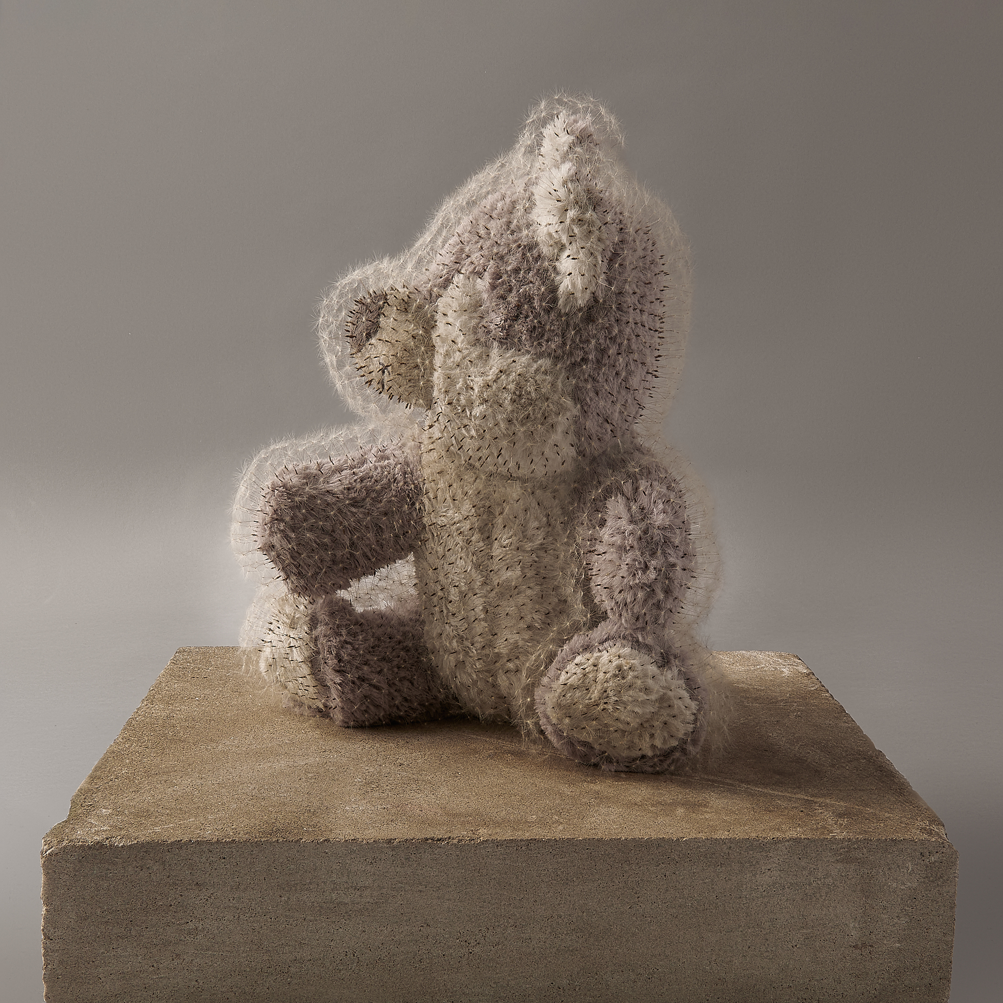 "A Stitch in Time, 2023" - Discarded stuffed animals from children’s graves, wood, and dandelions seeds.